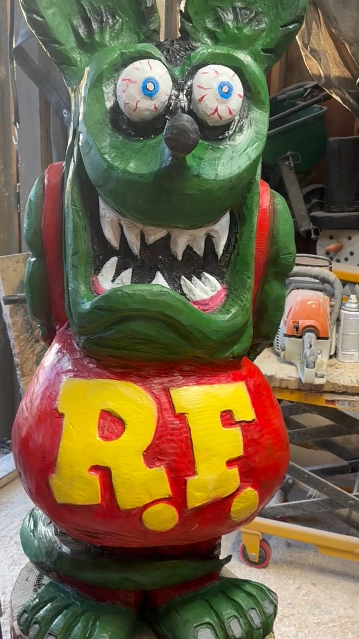 Chainsaw carved Rat Fink statue, a symbol of kustom kulture