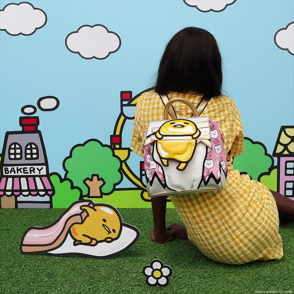 gudetama backpack hello kitty cafe Tan Western All-over Print while her signature red hair bow tops off the look gudetama | My Hello Kitty