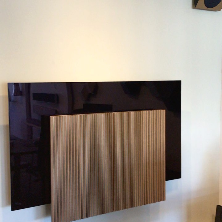 beovision Harmony 65” finished in Brass and Smoked Oak - wall