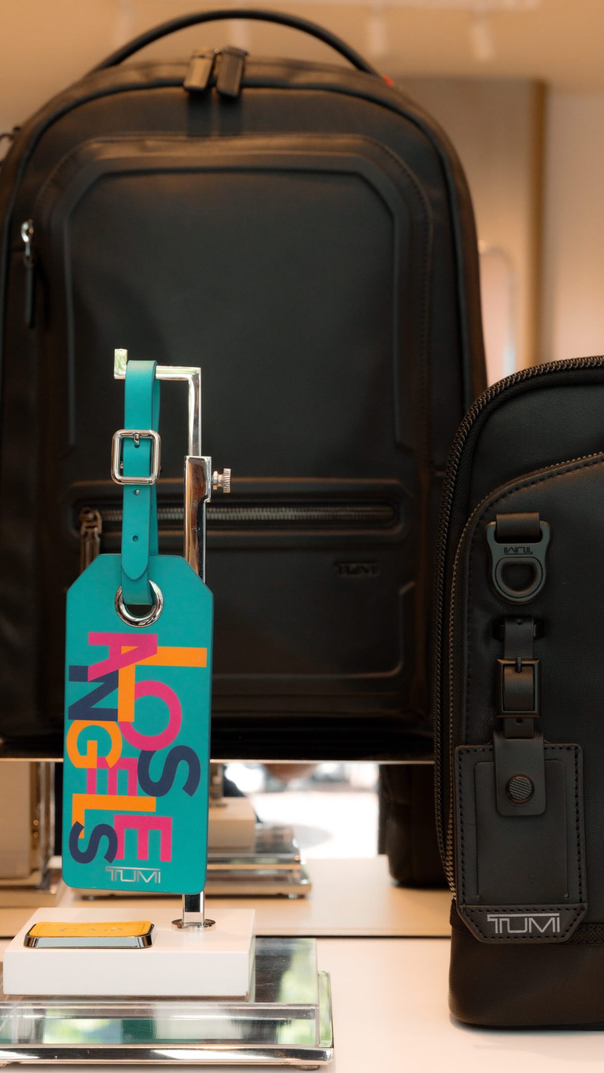 tumi backpack tag Black/Floral Packable  Second Serve Resale It has a multitude of organizational pockets for everything from your laptop to your phone Tumi Bags Tumi Tag Engraving