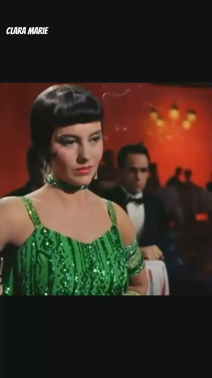 singing in the rain green dress Cyd Charisse's Emerald Singin' in 1952 gold hologram Latin dress with fringe