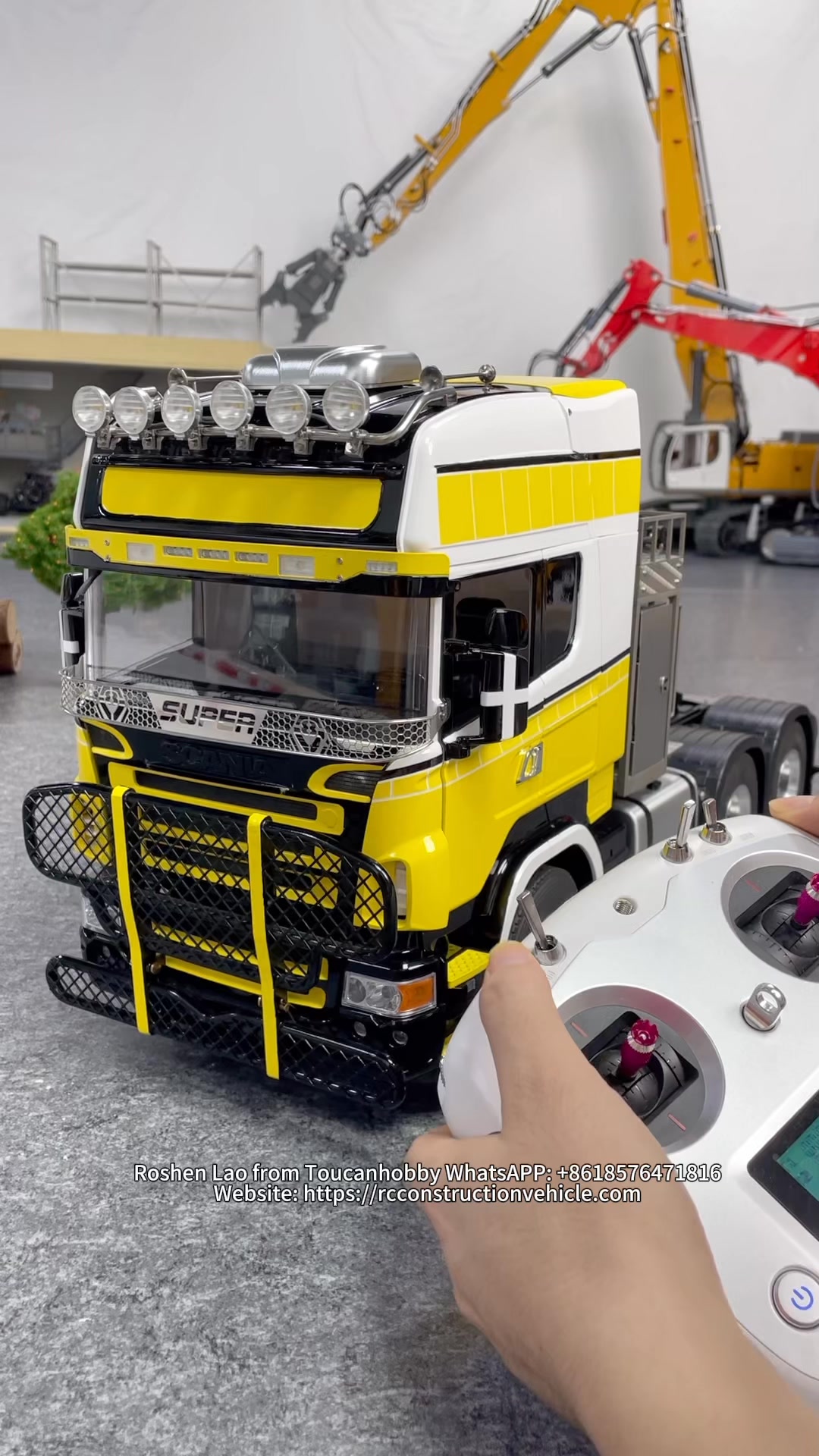 The 1:14 scale Scania 770s 6x6 tractor truck in red and white