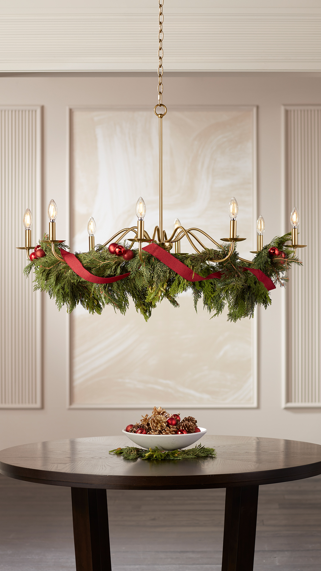 how to dress up a chandelier for christmas Decorate with Garland 🌿, ☃ Turn on your favorite holiday music, 🎄 Gently drape garland over chandelier. Attach with green pipe cleaners where needed, ✂️ Trim any excess garland, 🎀 DENIM