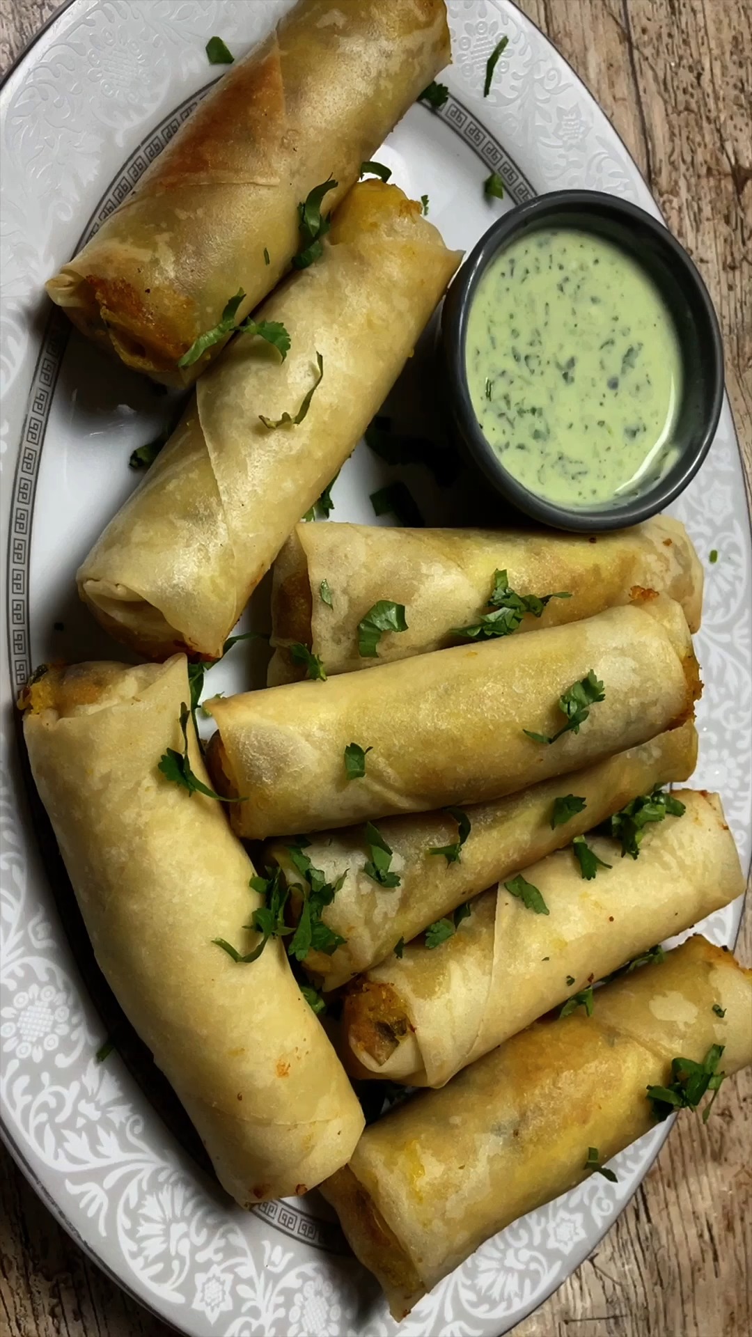 Enjoy crispy cheesy potato spring rolls, a delicious fusion of golden ...