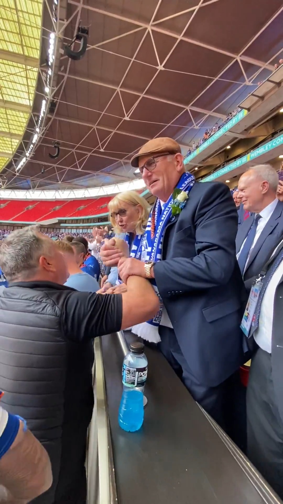 A lovely moment between manager Micky Mellon and owner Frank Rothwell ...
