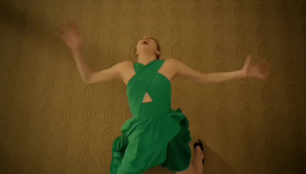 margaret qualley dancing green dress in a short film ad for Kenzo. It was directed by Spike Jonze, and choreographed by Ryan Heffington margaret qualley ballet video