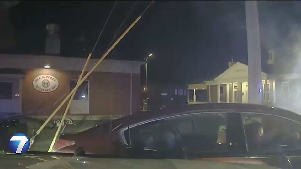 Suspected drunk driver rams police cruisers, knocks over utility pole ...