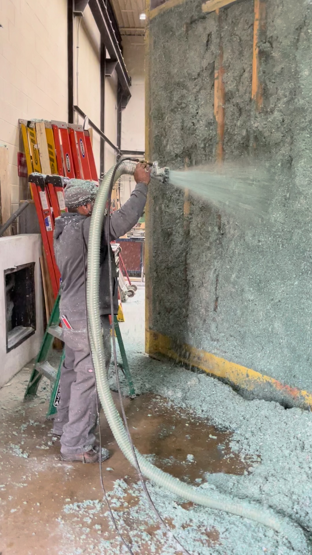 David is shown here installing our firewall approved cellulose ...