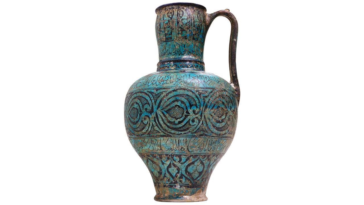 This iridescent pottery pitcher from twelfth century Persia was