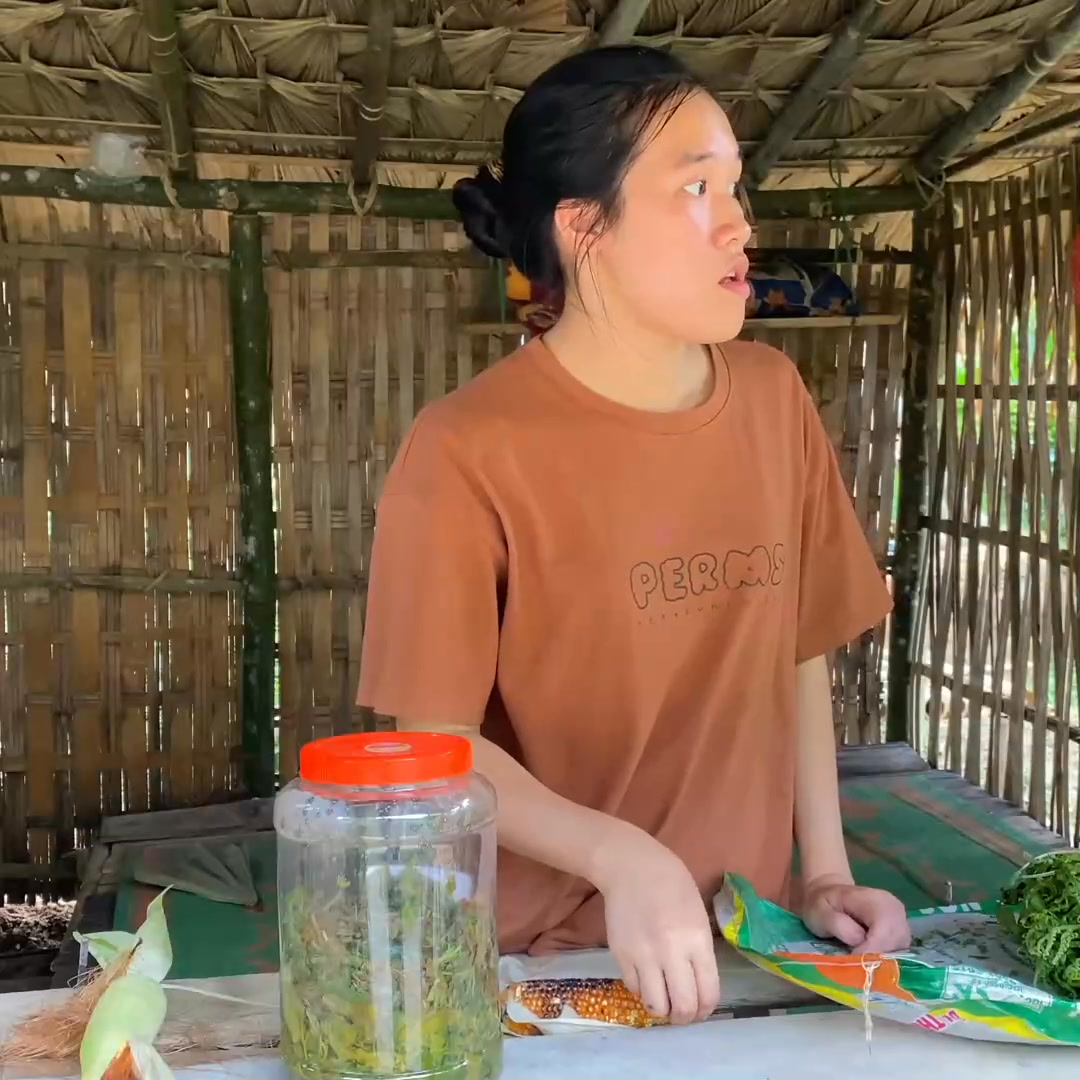 The girl harvests vegetables and catches fish to sell at the market ...