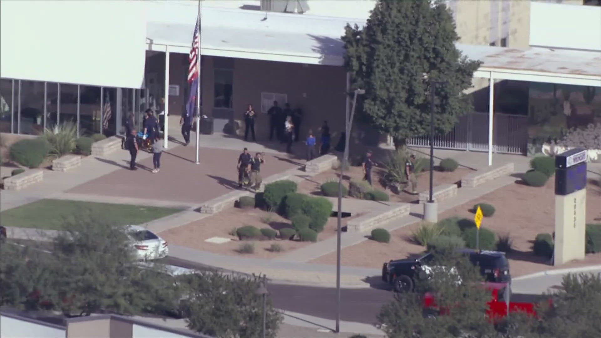 Several students and members of the Queen Creek Middle School staff ...