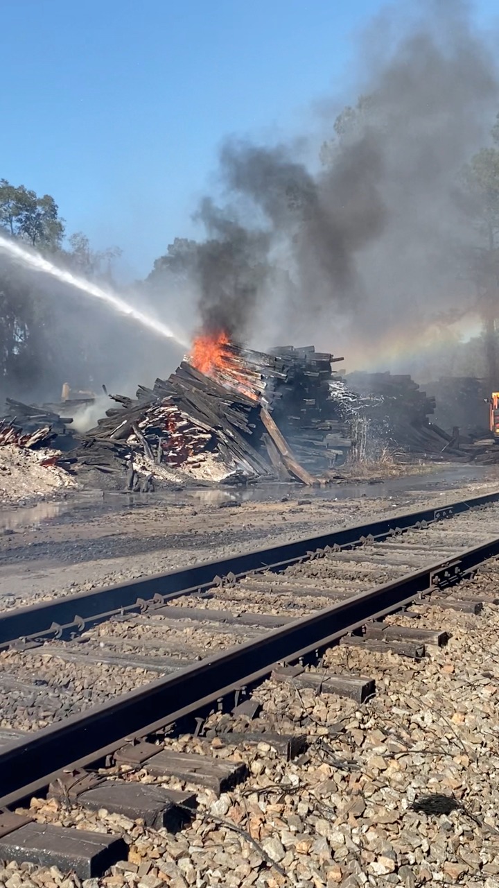 A major railroad tie fire near Dunnellon brought together local ...