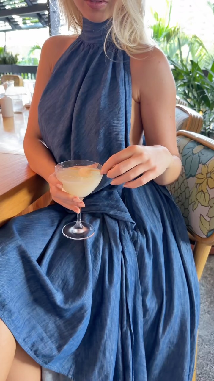 Getting dressed is easy when it’s from Zimmermann. The Australian brand’s Sundance halter denim dress is helping us soak up every bit of summer. | Bal Harbour Shops