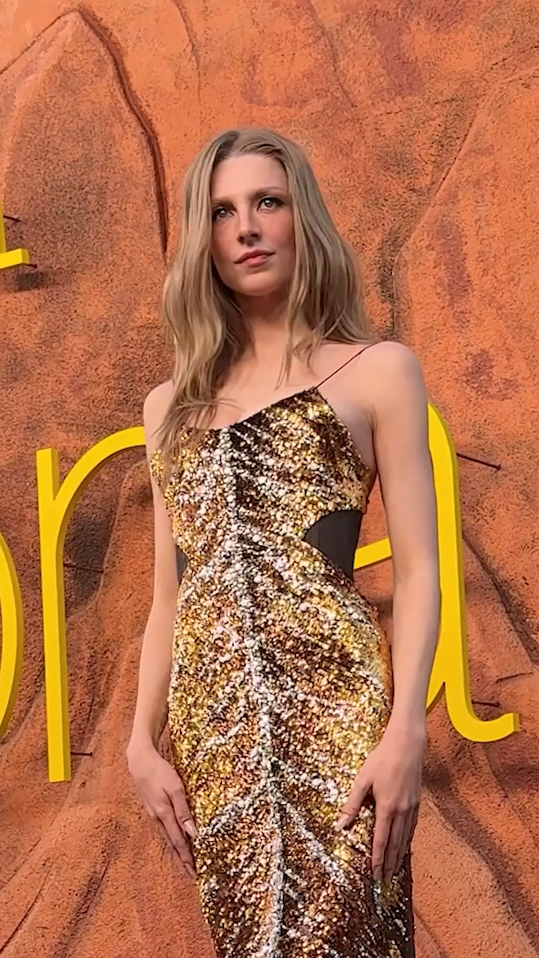 hunter schafer gold dress at Euphoria Premiere in Sequin Gown tassel
