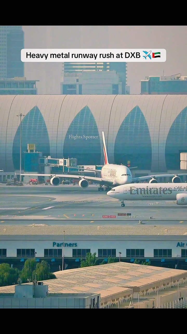 An Emirates Boeing 777-300ER spools up for departure, with the