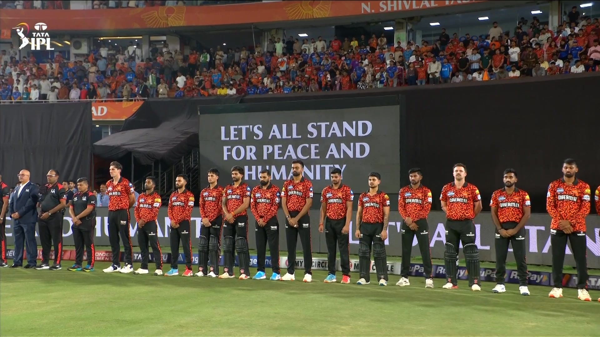 Let's all stand for peace and humanity. A minute's silence was observed ...