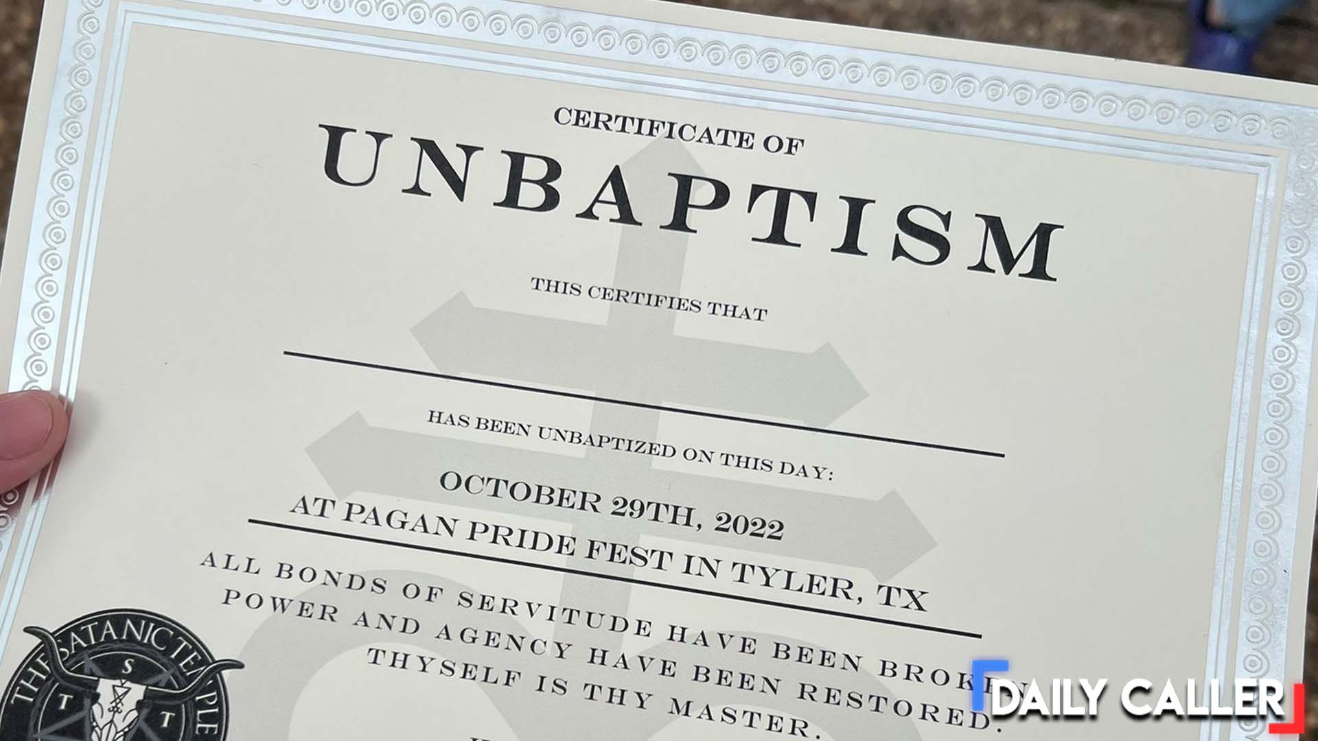 Watch members of the satan temple perform unbaptism ritual at the Pagan ...