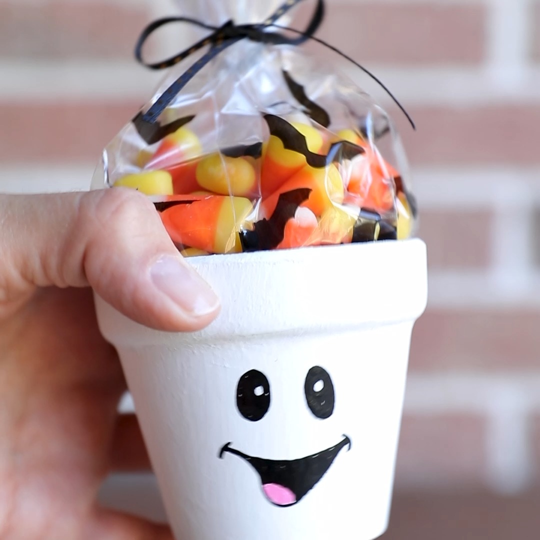 Make adorable Halloween flower pots with spooky and sweet