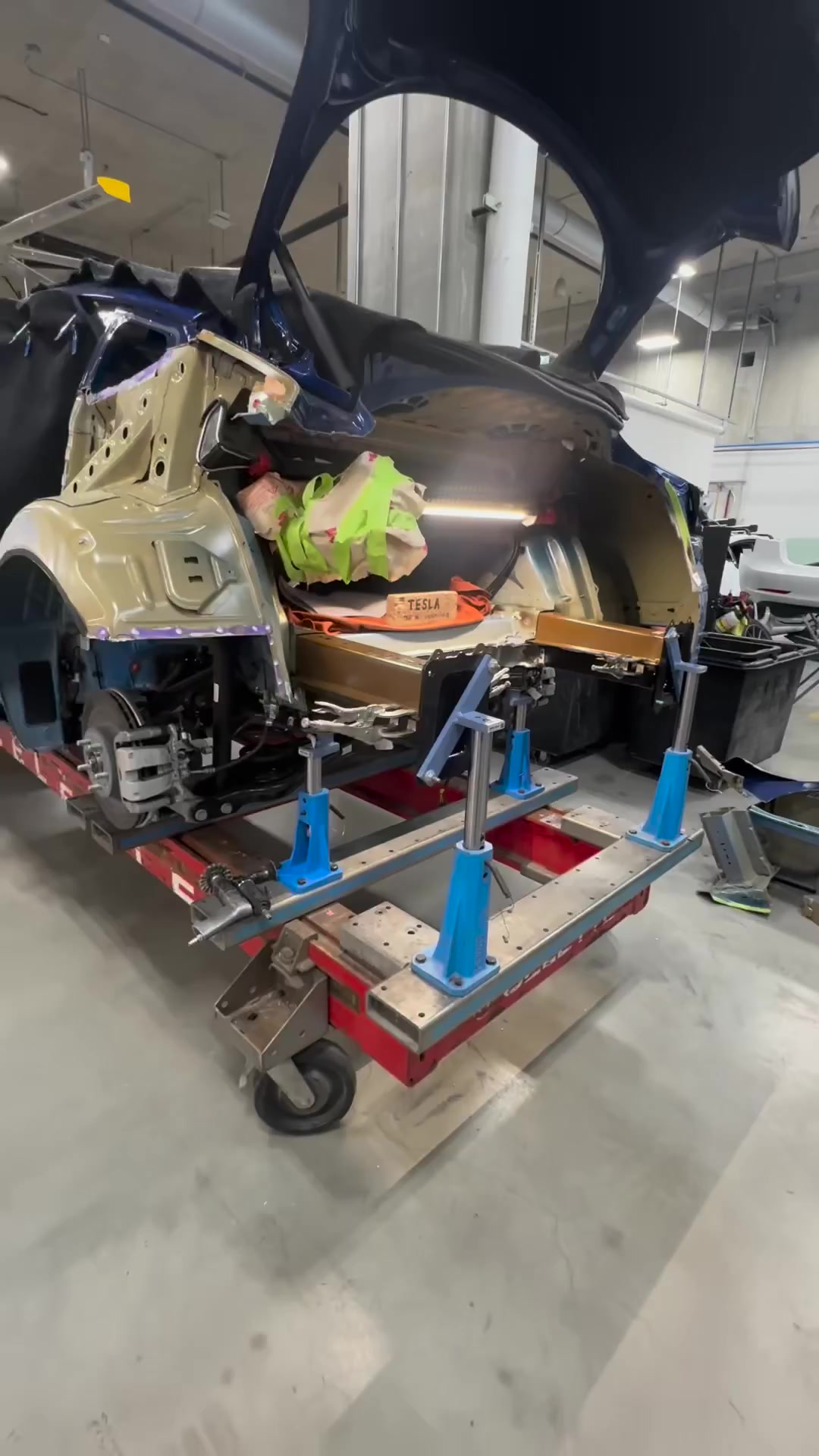 The rear frame rails of the Tesla Model 3 are aligned with the Celette ...