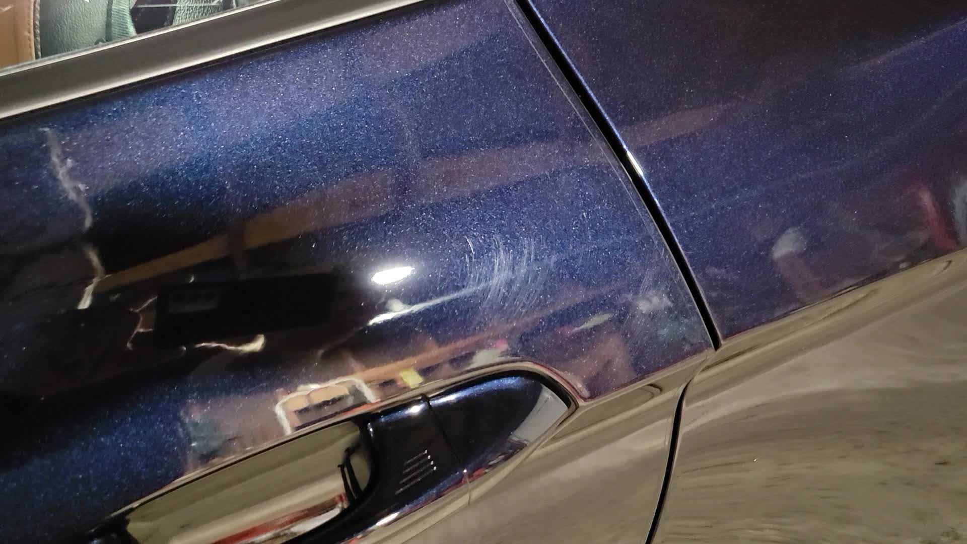 Why do scratches multiply by the handle on keyless entry doors?