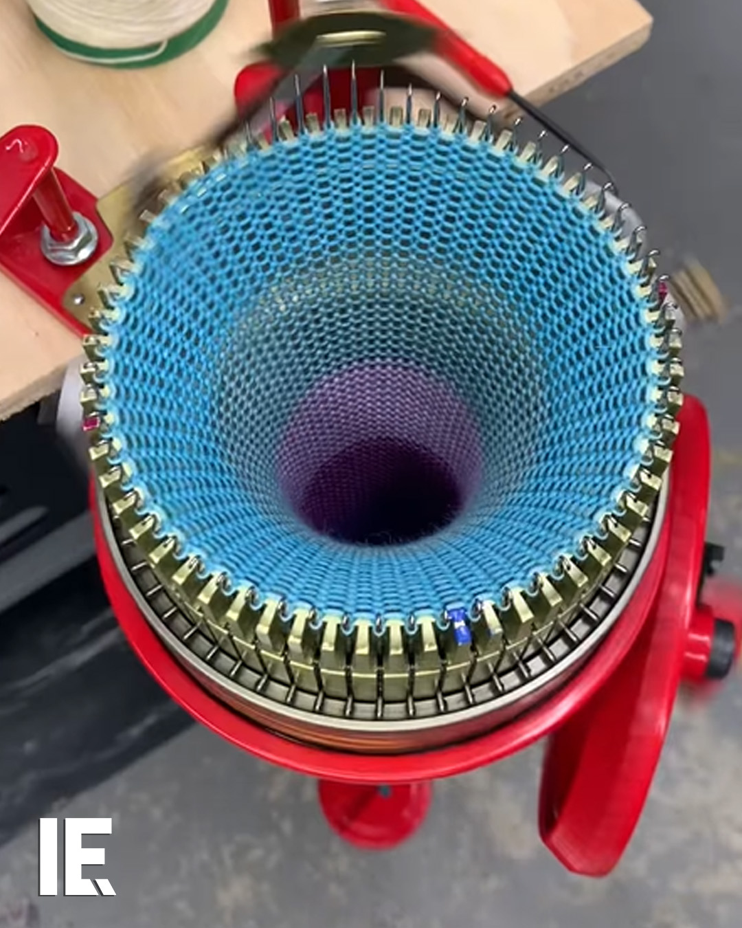 This circular sock machine creates a beautiful color-changing spiral as ...