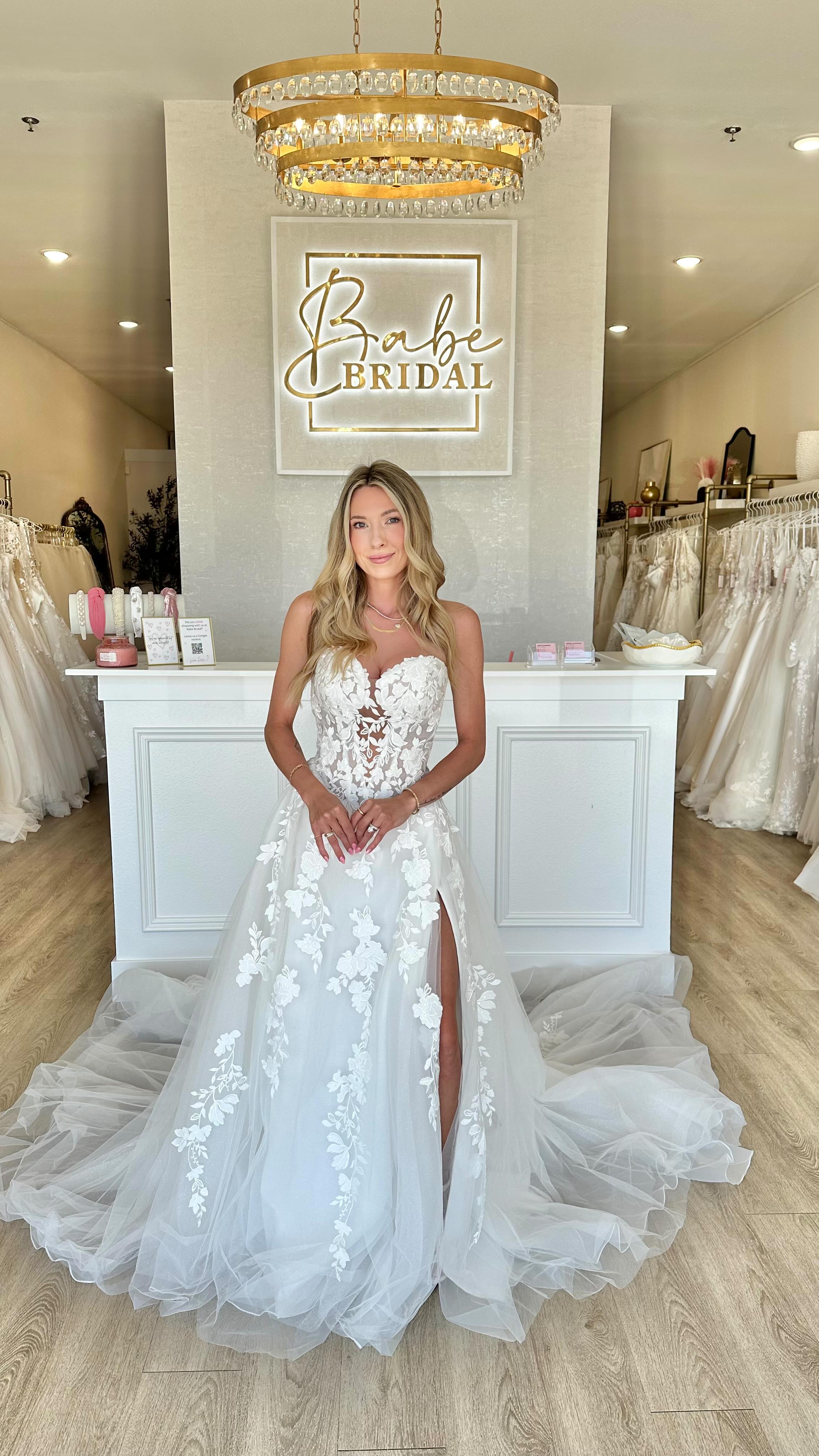 If you love lace, flowing skirts, and soft ruffles, we have the perfect wedding dress for you