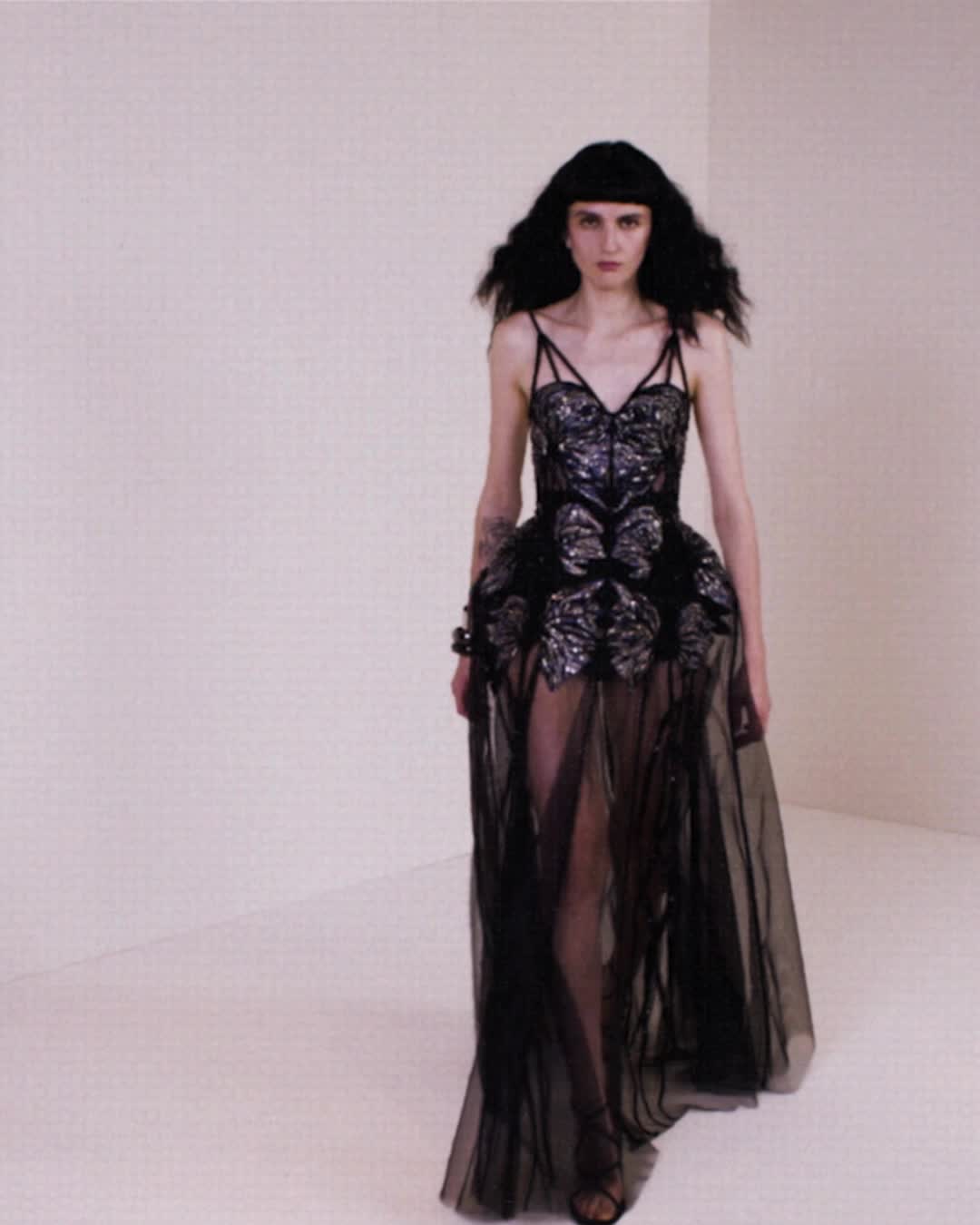 cage corset dress A black with jet embroidered straps and bone detailing, a hip and blue, black and silver bead bellflower embroideries on a skeletal tulle base., Discover the #McQueenPreAW22 Gold Size:W-16 NA-09.11.26AM The Best Christmas Costumes boned cage corset with
