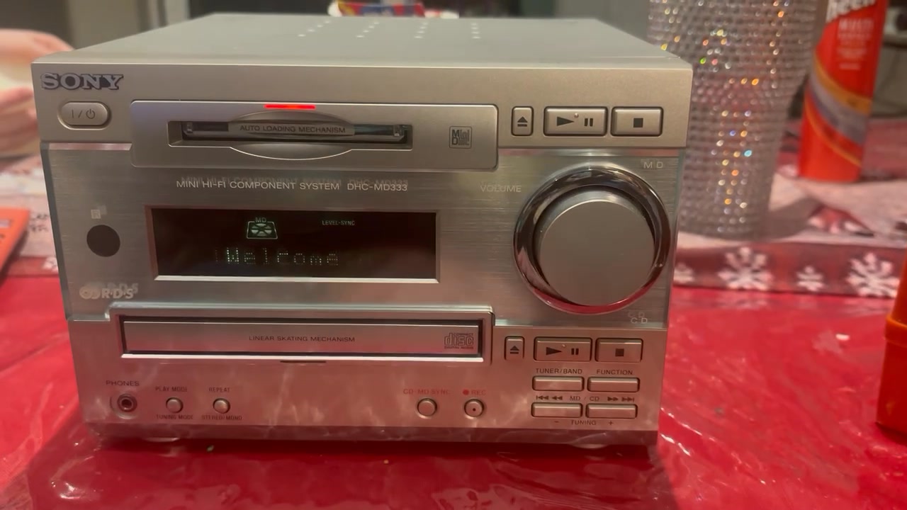 I have a Hitachi AX-M7 that includes a minidisc recorder. It won't