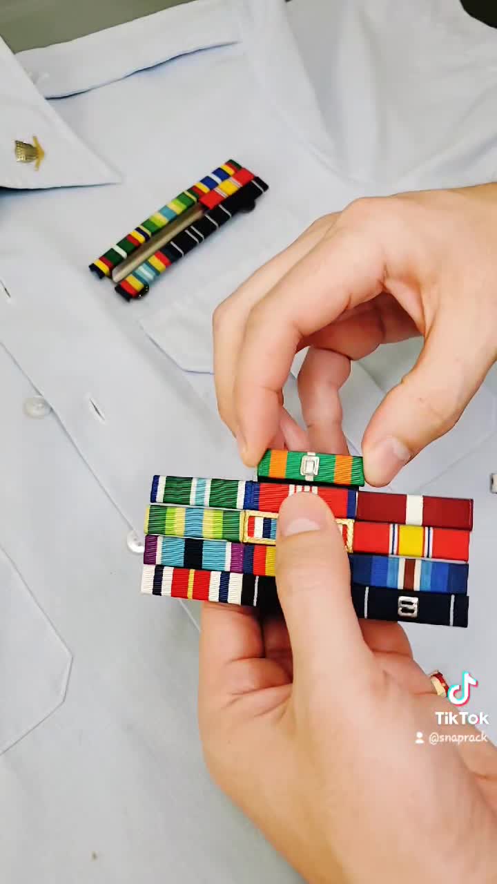 A demonstration of the best way to fit the gold border ribbon onto