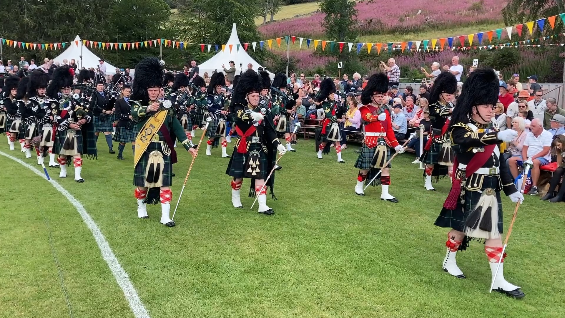 Massed Bands parade with the Lonach Highlanders during the 2022 Lonach ...