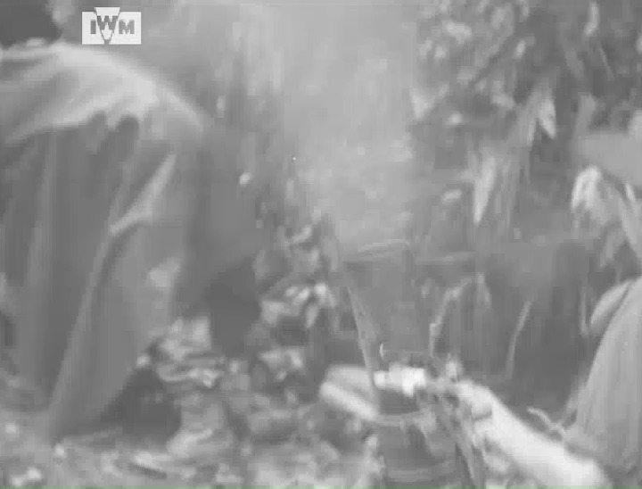 Chindits fire an Ordnance ML 3-inch mortar in the area of the Mogaung ...