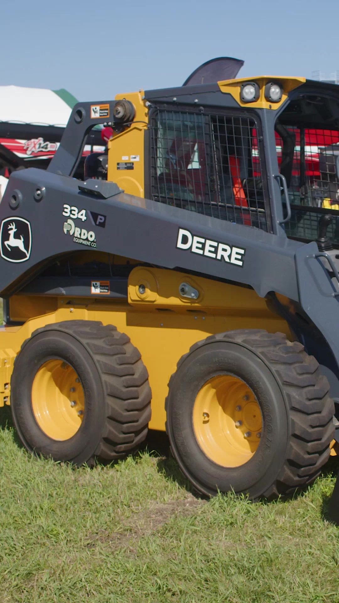 A closer look at the John Deere 335P and 334P skid steers — two compact ...