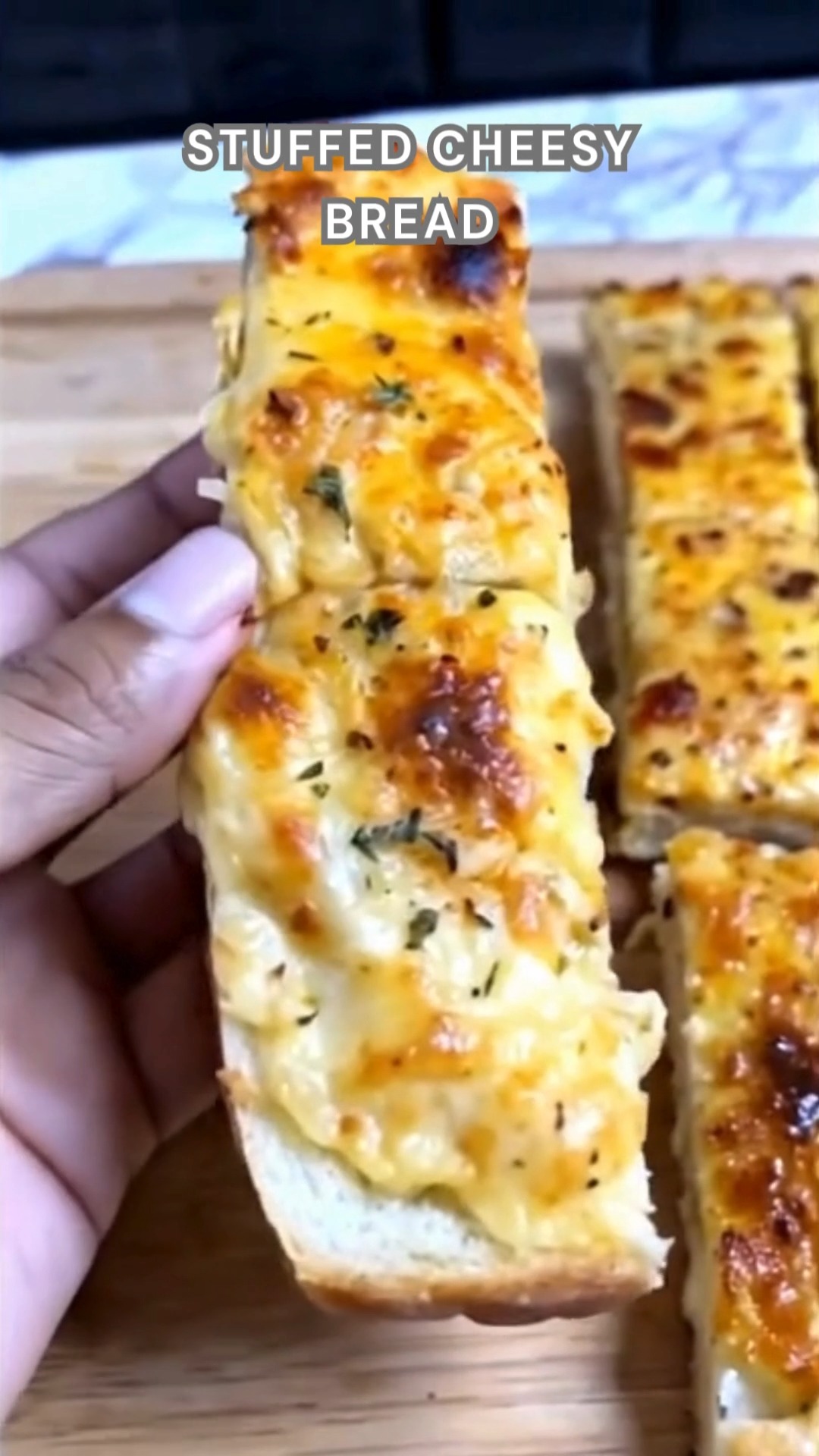 Bread split open. Fill with mozzarella, garlic, butter, parsley. Bake ...