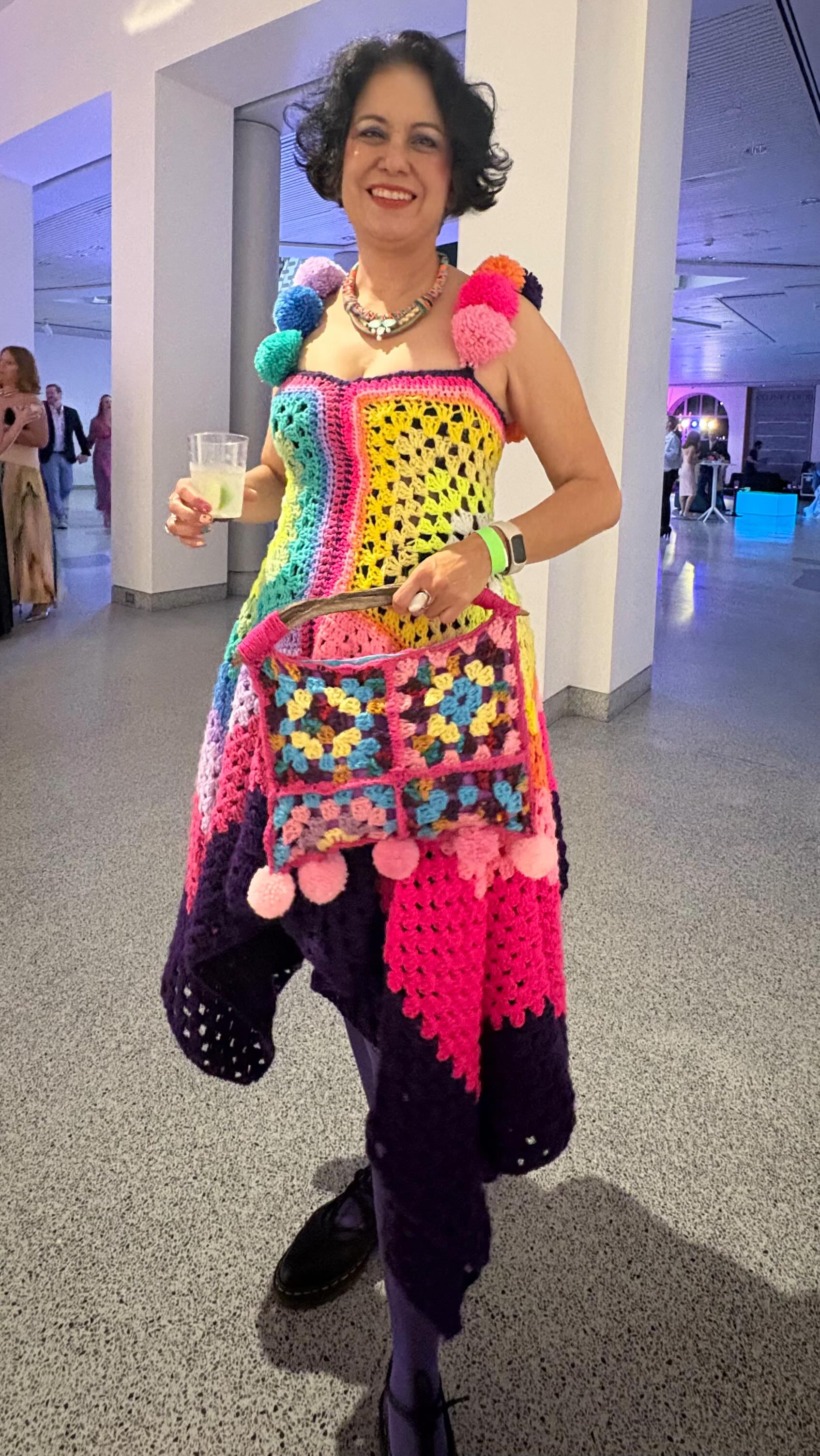 I made a custom crochet dress with Pompom straps and a one of a kind crochet purse with a branch handle for @almagratia for the avant Garde ball @mcasandiego #crochet #crocheting #pompom