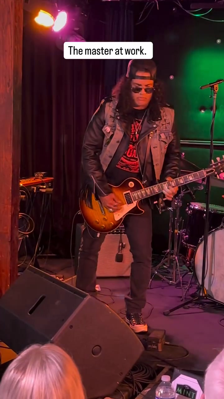 Slash performing at 