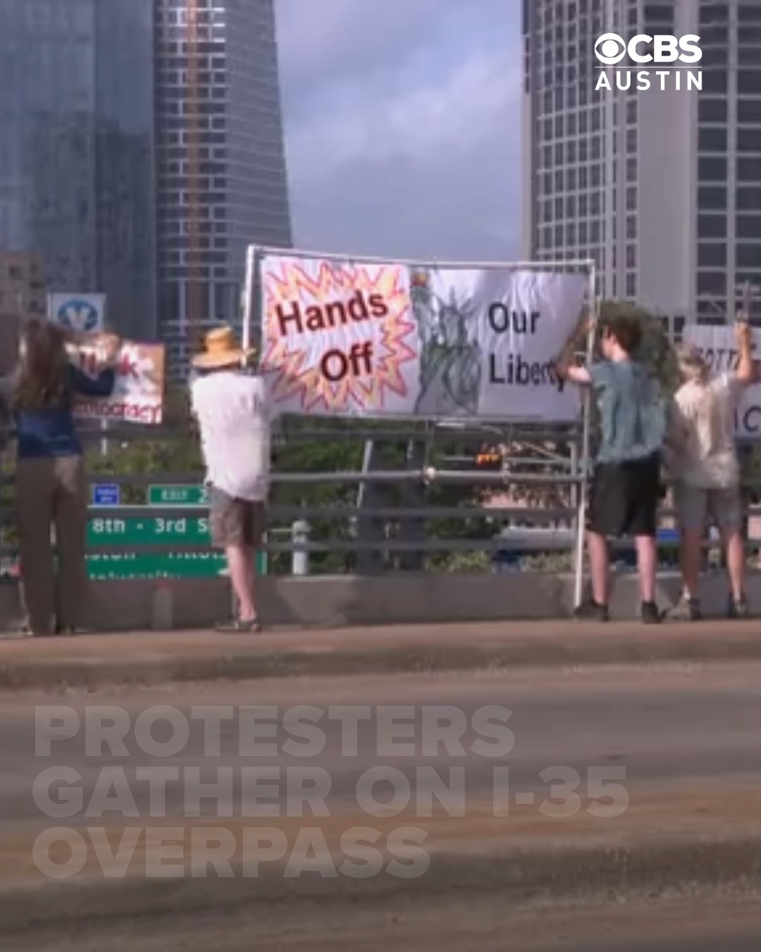 Protesters were seen on the 12th Street overpass above I-35 Friday ...