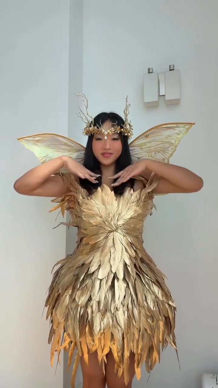 gold dress halloween costume ideas Day 2 of making Kendall Jenners golden forest fairy ✨ What do you think of the costume so far? #halloweencostumeideas # halloweencostume #costumeideas #diycostume #diyclothes #kendalljenner swatch:the-metallic-gabriella-dress-red-foil-606