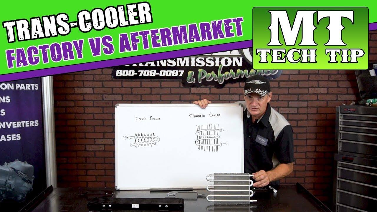 Curt has some transmission coolers and a white board to show how