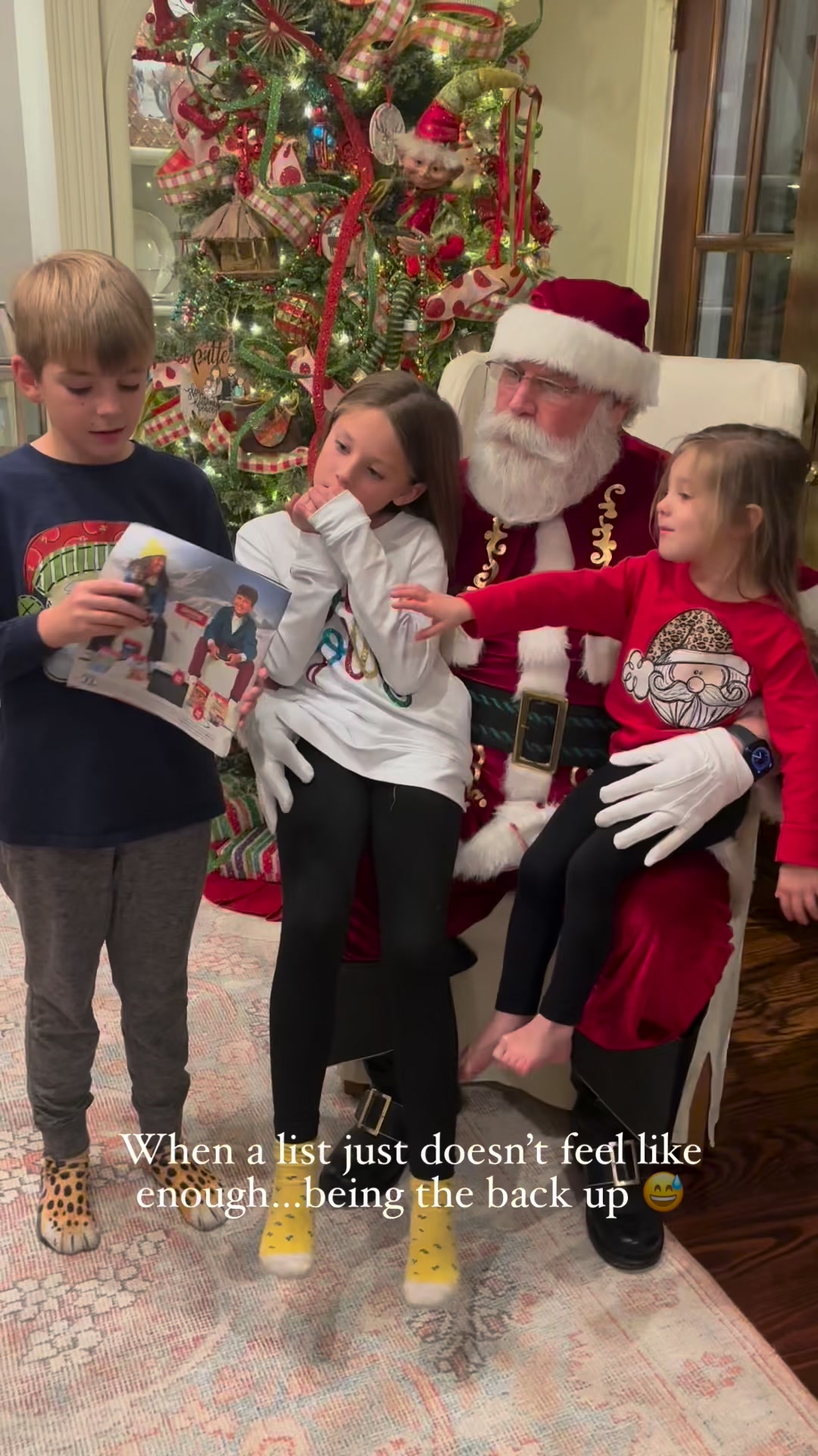 These kids were fully prepared for Santa this year, pictures and all ...