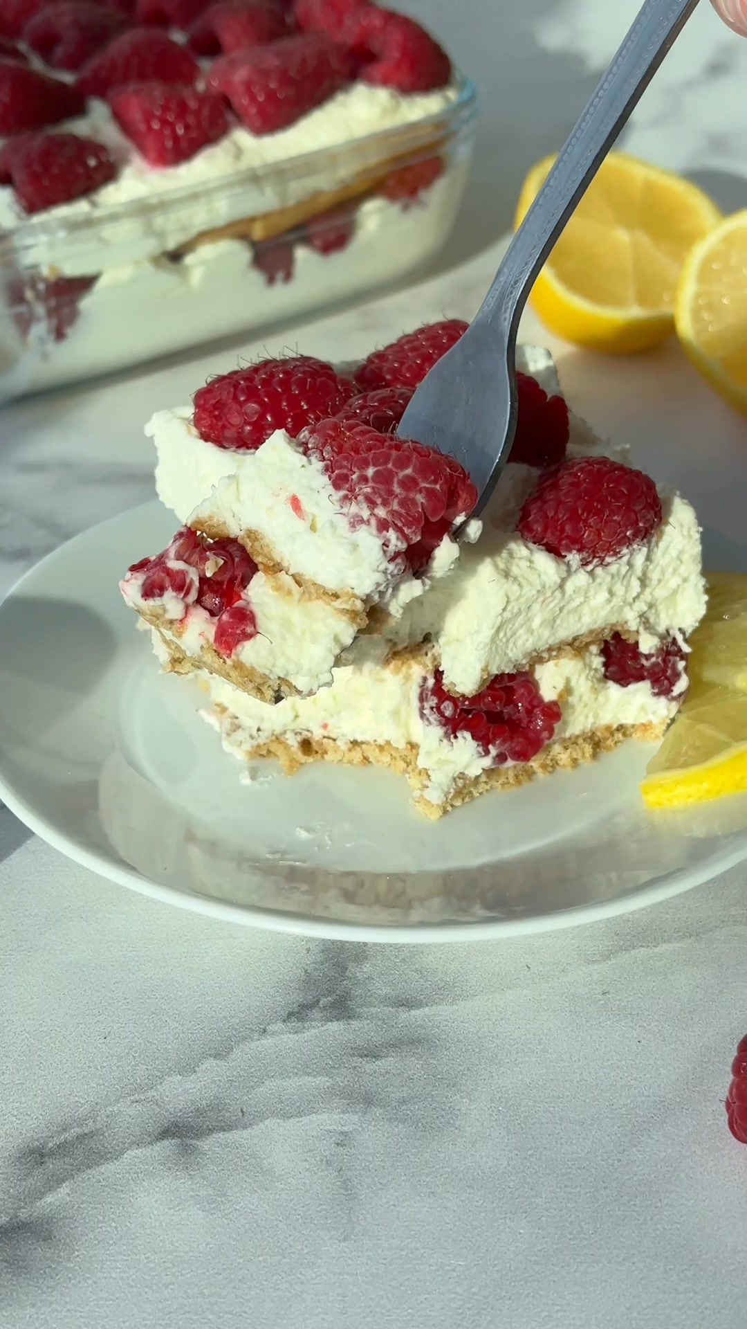 Recipe: https://www.thereciperebel.com/no-bake-lemon-raspberry-icebox ...