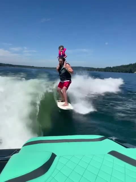 Father/daughter surf sesh on the 24RZX! #tigeboats #tige #24rzx