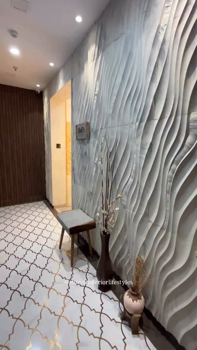 This double-door entry features a unique designer pattern with ...