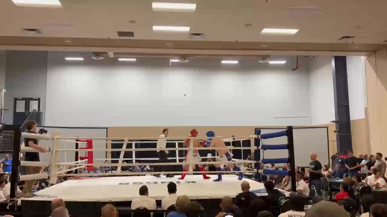 Curtis is in red. First round. Bit of a Ruff start..lol. great fight ...