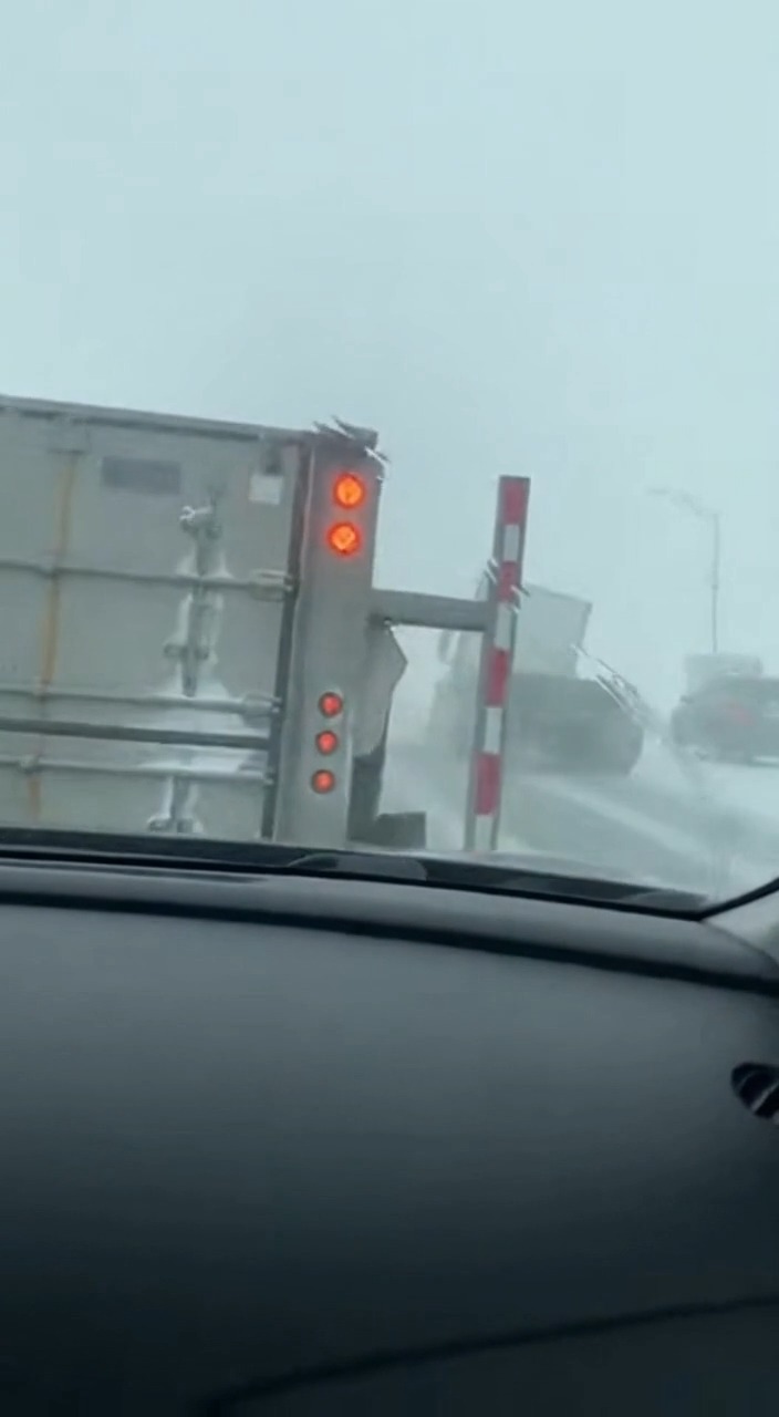 While moving at speed, the container truck failed to clear an ...