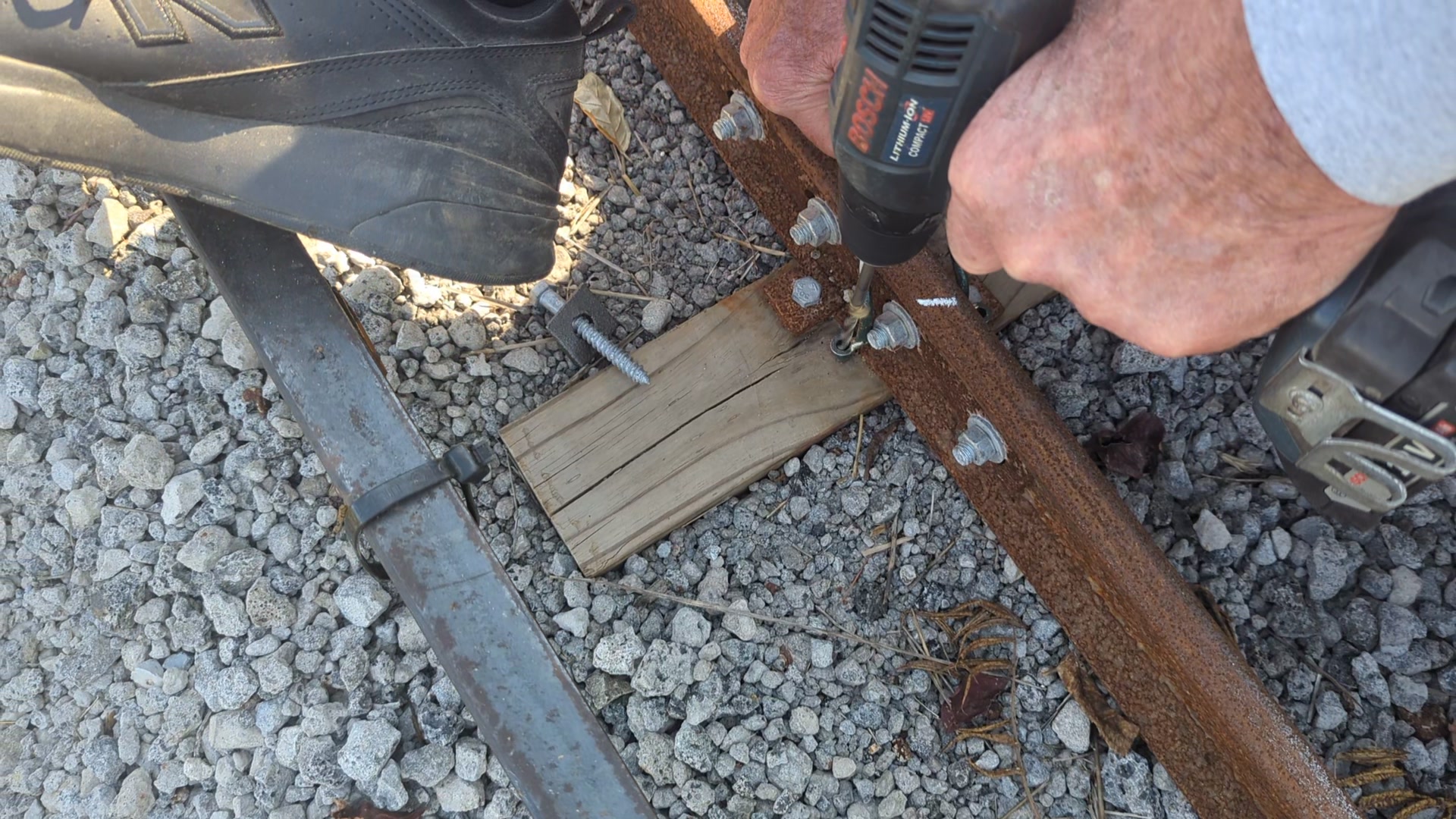 The track crew installing rail fasteners at the Michigan Flywheelers ...