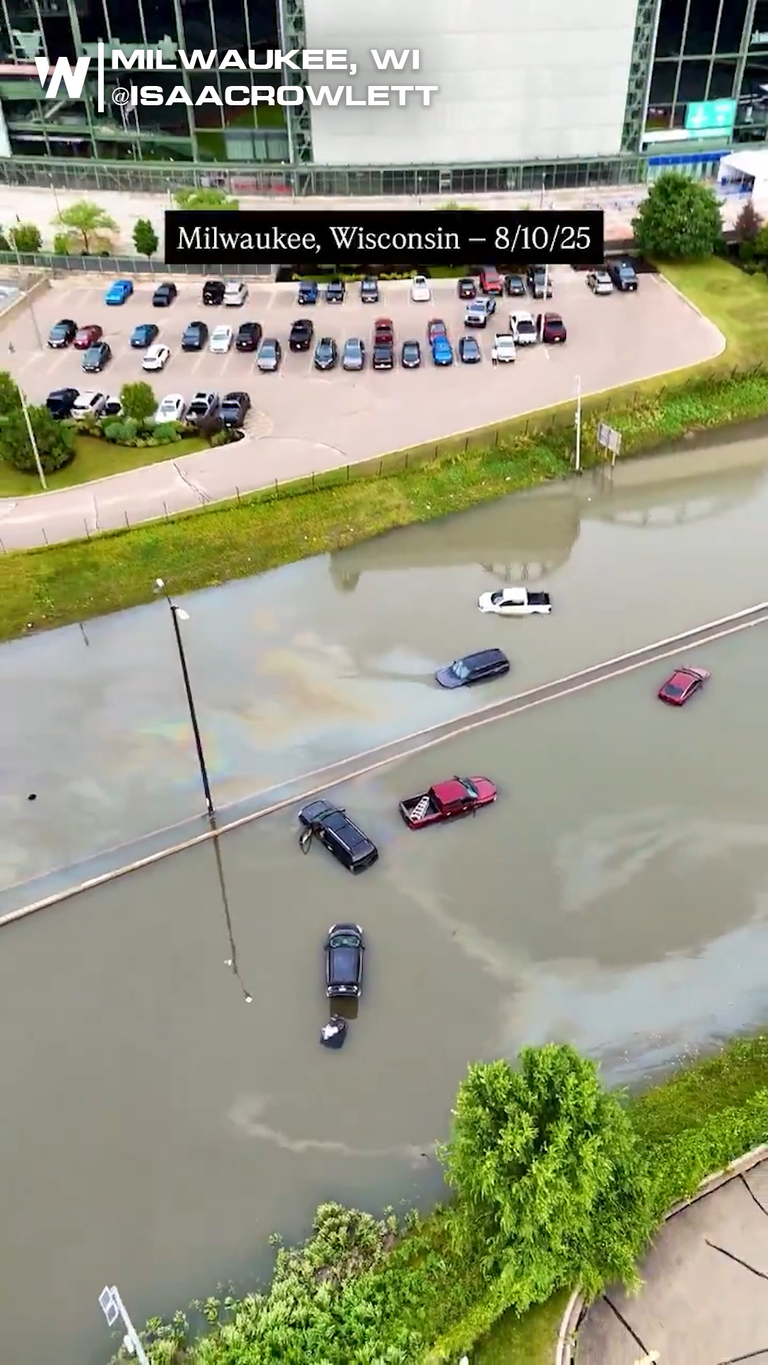 Flash flooding turned roads outside Milwaukee’s Brewers Stadium into ...
