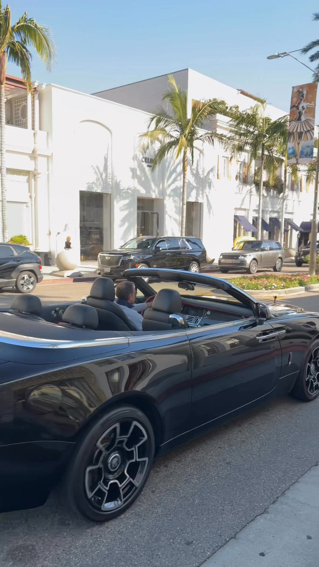 A Rolls-Royce Dawn Black Badge was spotted cruising down Rodeo Drive ...