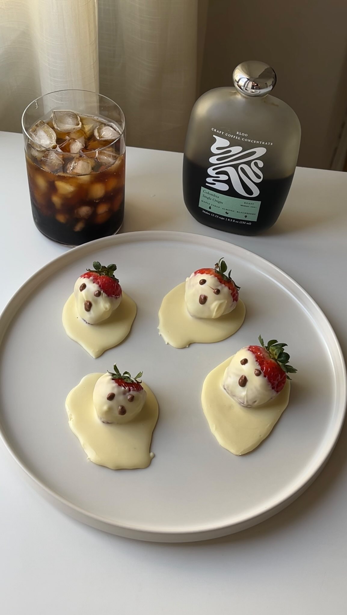 Scarily simple. Strawberry ghosts made with white chocolate and a side ...