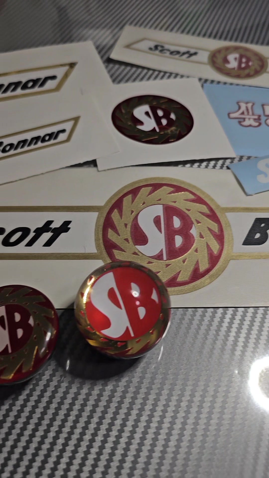 A couple of unreelknobs chrome OG scott bonnar sticker kits and ...