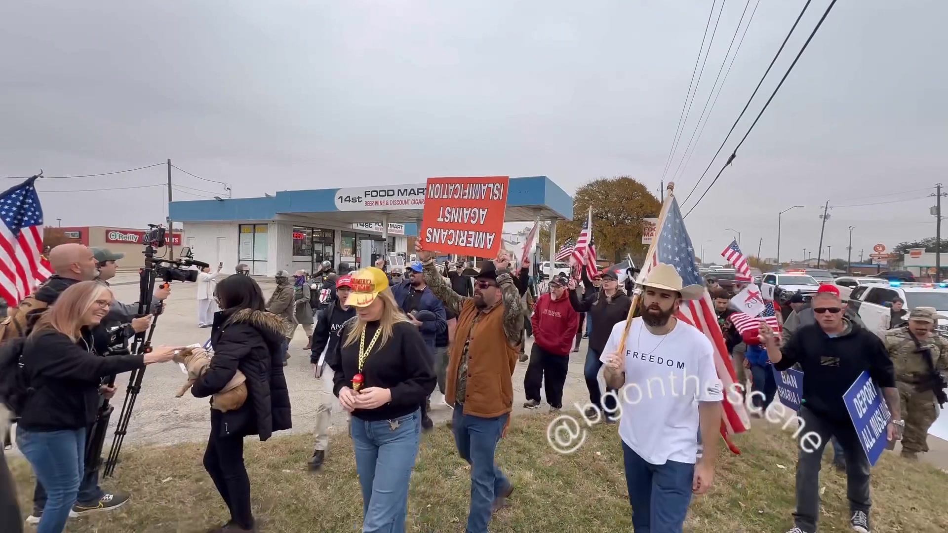 Anti-Islam protesters chanting as they marched towards the Plano ...